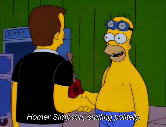 Homer Simpson, smiling politely.